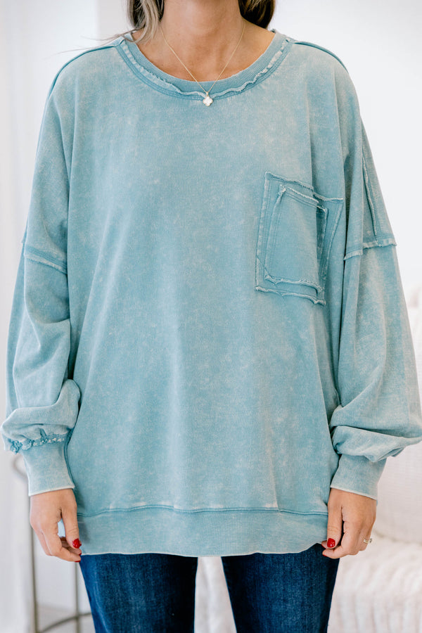 Chic Soul plus size clothing, light blue long sleeve pullover with front pocket and distressed seams 
