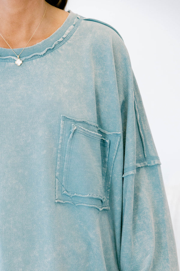 Chic Soul plus size clothing, light blue long sleeve pullover with front pocket and distressed seams 