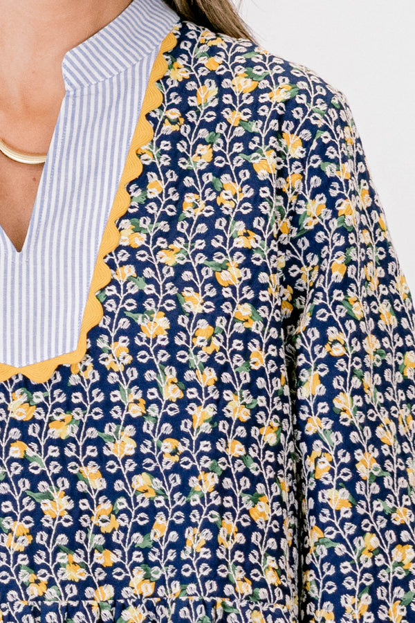 Chic Soul plus size clothing, navy and yellow floral print long sleeve short tiered knee length dress with v neckline and striping around collar and yellow scalloped