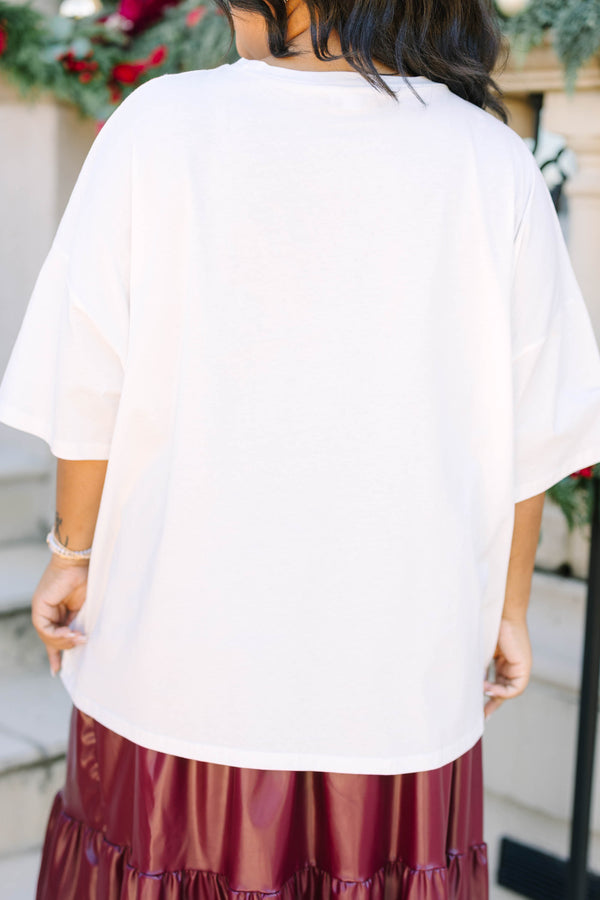 Plus size white boyfriend tee with Christmas cocktail graphics and a relaxed, flowy fit.