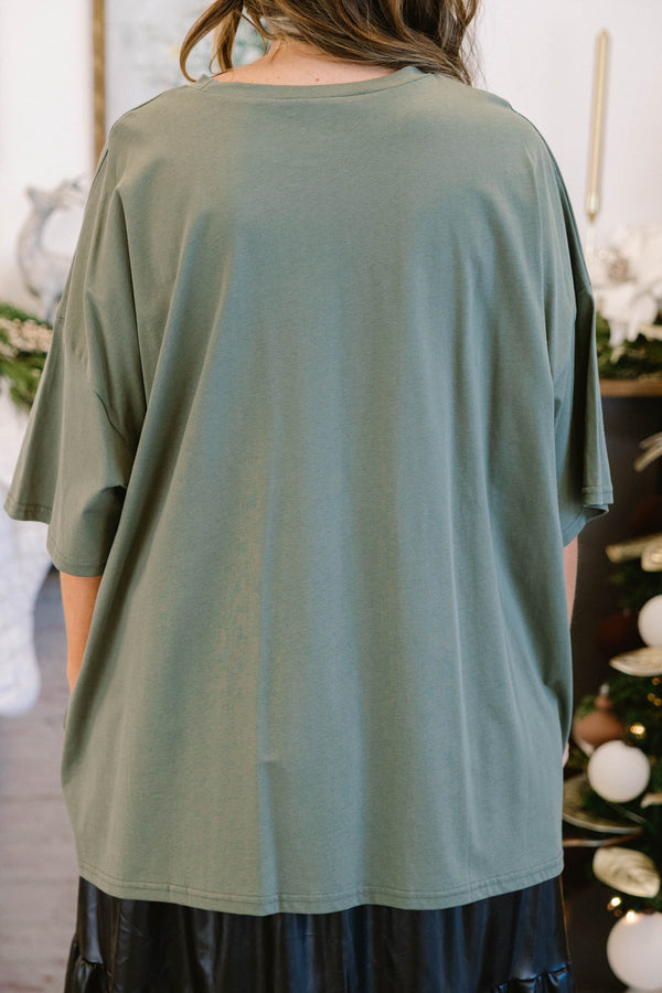 Chic Soul plus size clothing, moss green short sleeve boyfriend tee with checkered border and three flocked winter trees in the middle 
