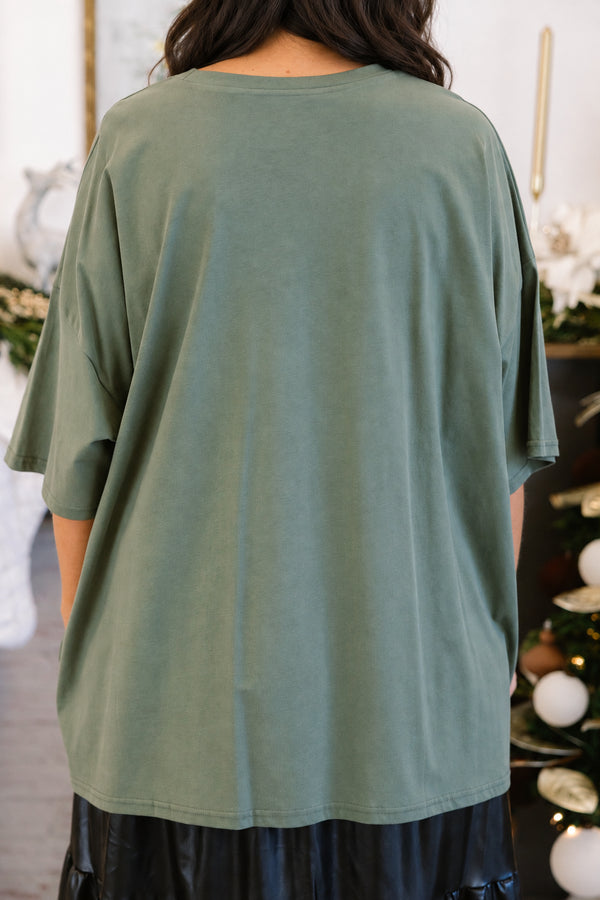 Chic Soul plus size clothing, moss green short sleeve boyfriend tee with checkered border and three flocked winter trees in the middle 