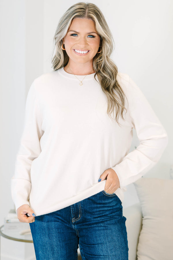 Plus size oatmeal crewneck sweater with a relaxed fit and soft, stretchy knit fabric.