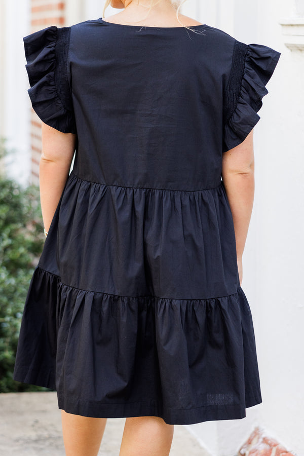 Chic Soul plus size clothing, short-flutter-sleeve black ruffled baby doll dress with brown sequined football patches scattered across dress with square neck-line