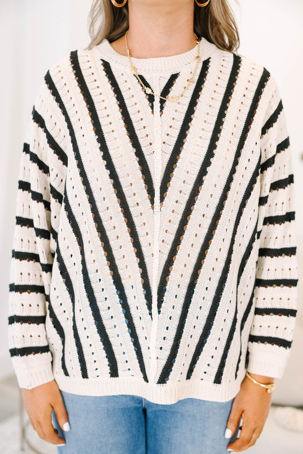 Plus Size cream and black chevron striped pointelle knit sweater with long sleeves and crew neck.
