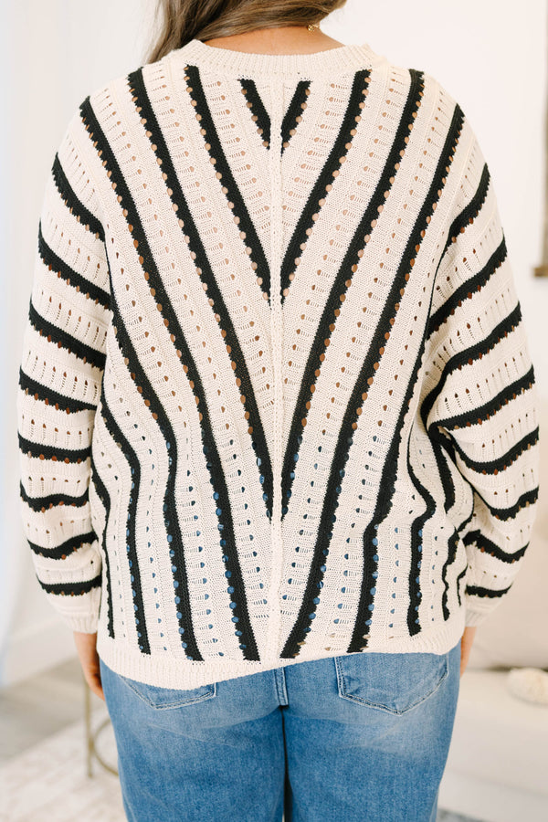 Plus Size cream and black chevron striped pointelle knit sweater with long sleeves and crew neck.