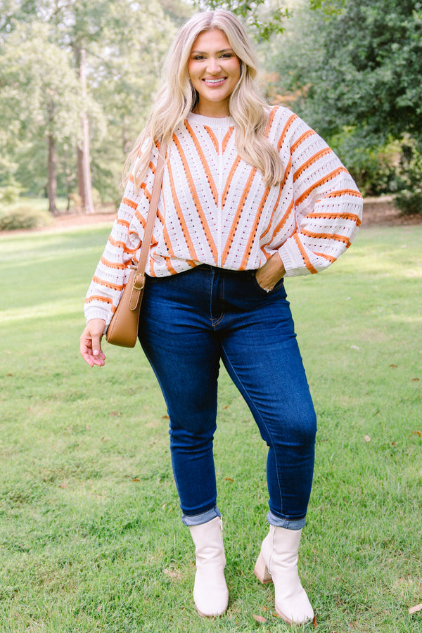 Chic Soul plus size clothing, white knit long sleeve sweater with coral stripes in a v pattern on the body and horizontal stripes on the sleeves