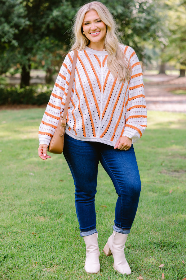 Chic Soul plus size clothing, white knit long sleeve sweater with coral stripes in a v pattern on the body and horizontal stripes on the sleeves