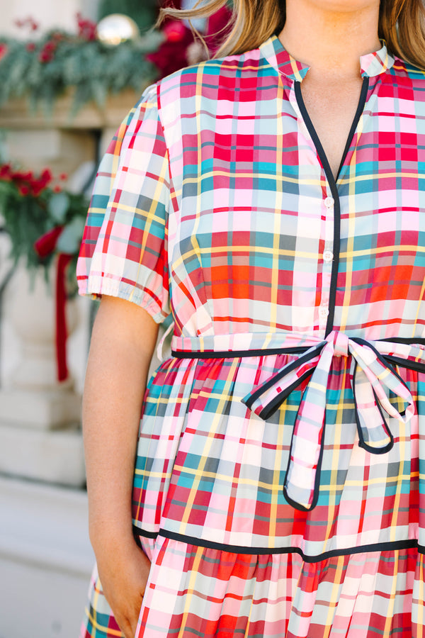 Plus size cream plaid tiered midi dress with a tie waist, short sleeves, and black bow heels.