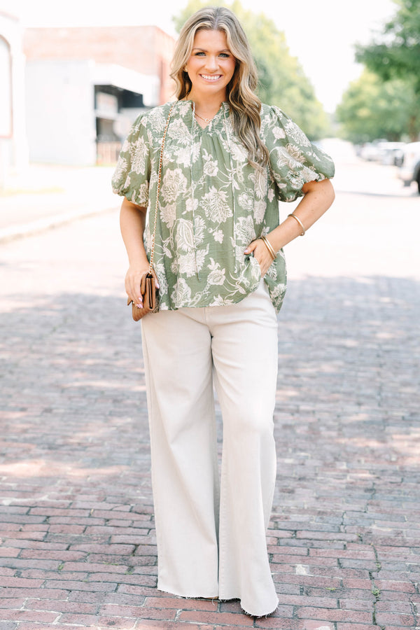 Plus Size almond-colored wide-leg jeans with a high-waist fit and raw-edge hem.