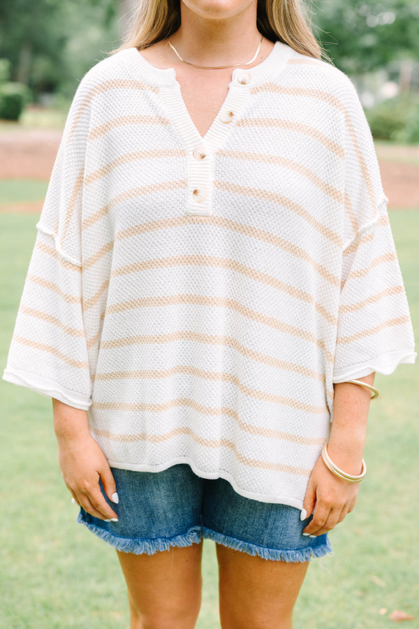 Plus Size natural and white striped knit top with a buttoned henley neckline and 3/4 sleeves.
