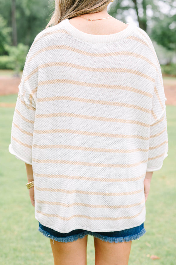 Plus Size natural and white striped knit top with a buttoned henley neckline and 3/4 sleeves.