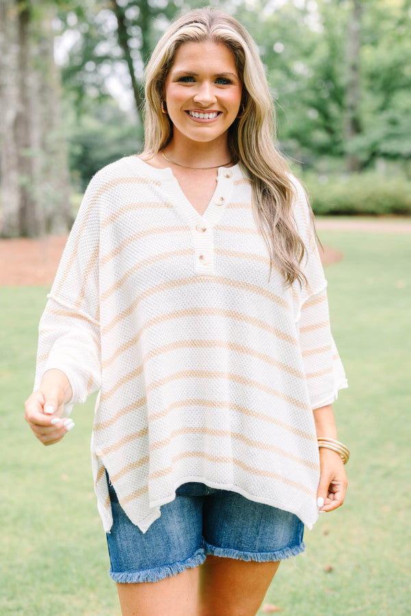 Plus Size natural and white striped knit top with a buttoned henley neckline and 3/4 sleeves.