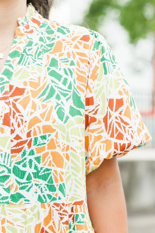 Chic Soul plus size clothing, orange short sleeve multi abstract print mini dress with tiered detail and v cutout along neckline with puff sleeves