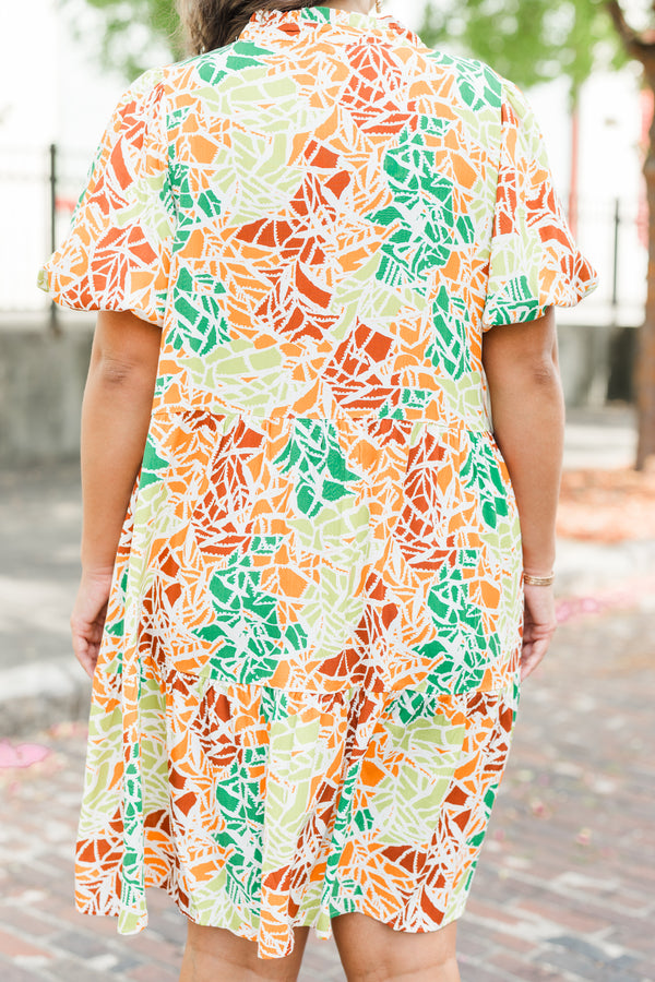 Chic Soul plus size clothing, orange short sleeve multi abstract print mini dress with tiered detail and v cutout along neckline with puff sleeves