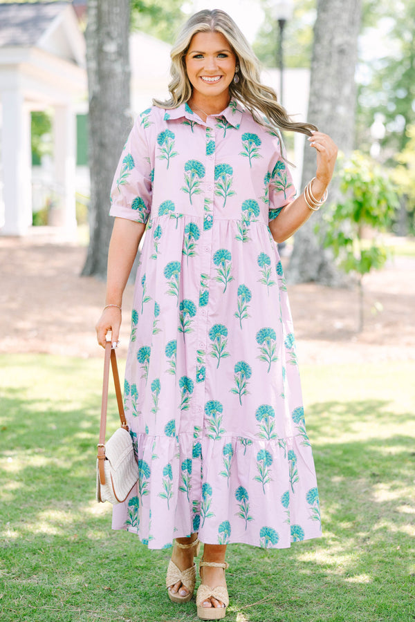 Plus Size light pink midi dress with a green floral print, button-up front, and tiered skirt.