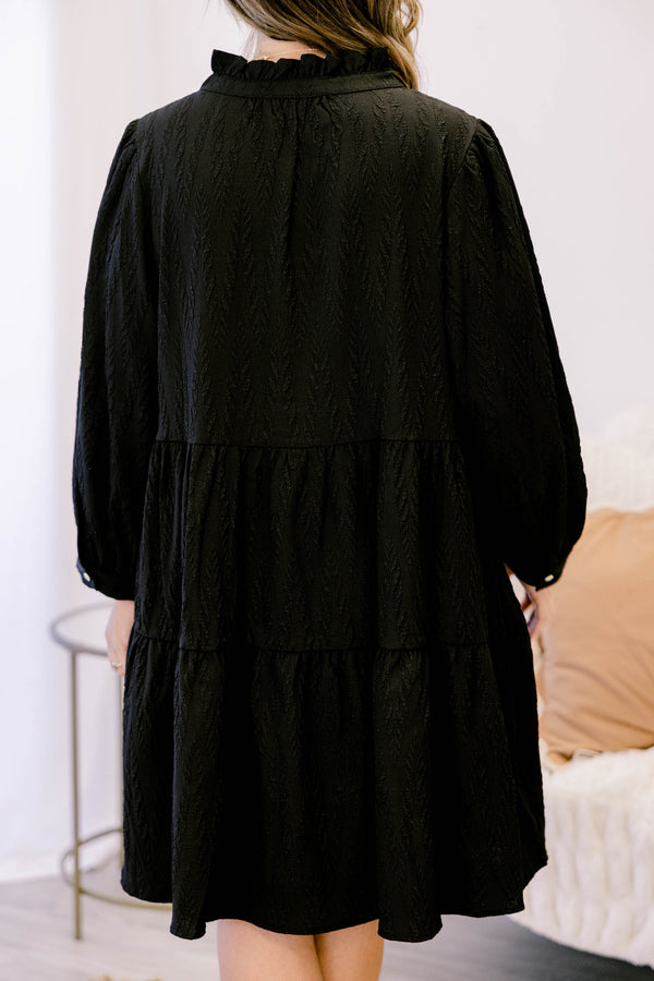 Chic Soul plus size clothing, black long sleeve short tiered dress with v neckline and 3 buttons below the neckline and a small collar