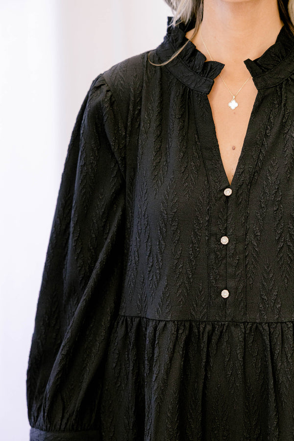 Chic Soul plus size clothing, black long sleeve short tiered dress with v neckline and 3 buttons below the neckline and a small collar