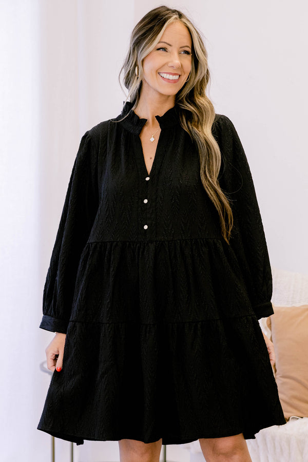 Chic Soul plus size clothing, black long sleeve short tiered dress with v neckline and 3 buttons below the neckline and a small collar