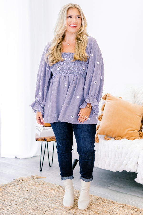 Chic Soul plus size clothing, dusty purple top with long sleeves that have a ruffle detail at the end of each sleeve and a white floral pattern throughout 