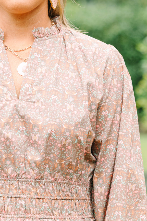 Plus Size brown floral cotton dress with a smocked waist, V-neckline, and three-quarter sleeves.