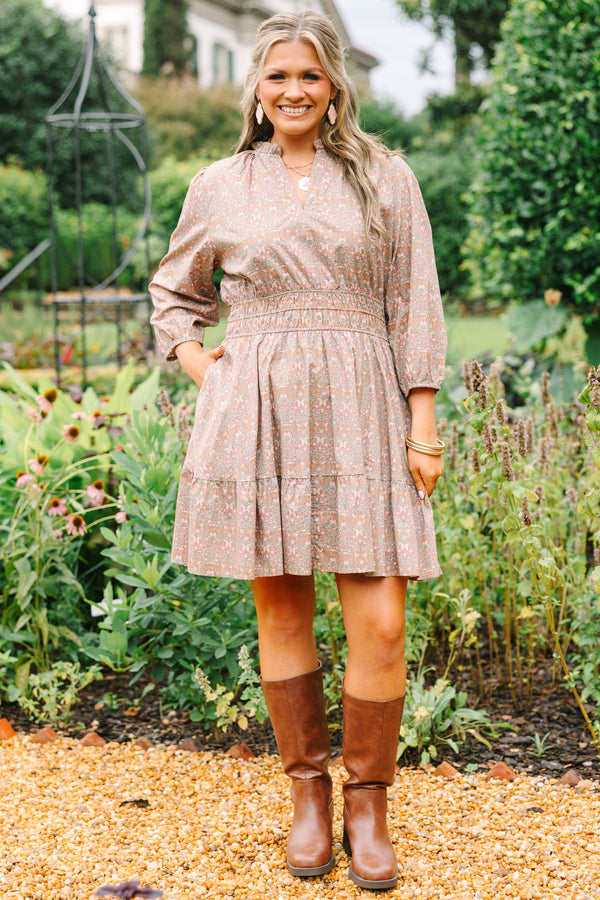 Plus Size brown floral cotton dress with a smocked waist, V-neckline, and three-quarter sleeves.