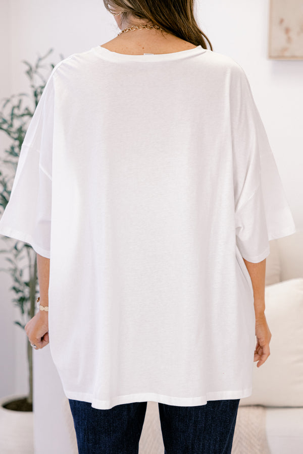 Chic Soul plus size clothing, oversized white boyfriend tee with Christmas vintage cartoon graphics and “Merry & Bright” written in the middle in vintage style font