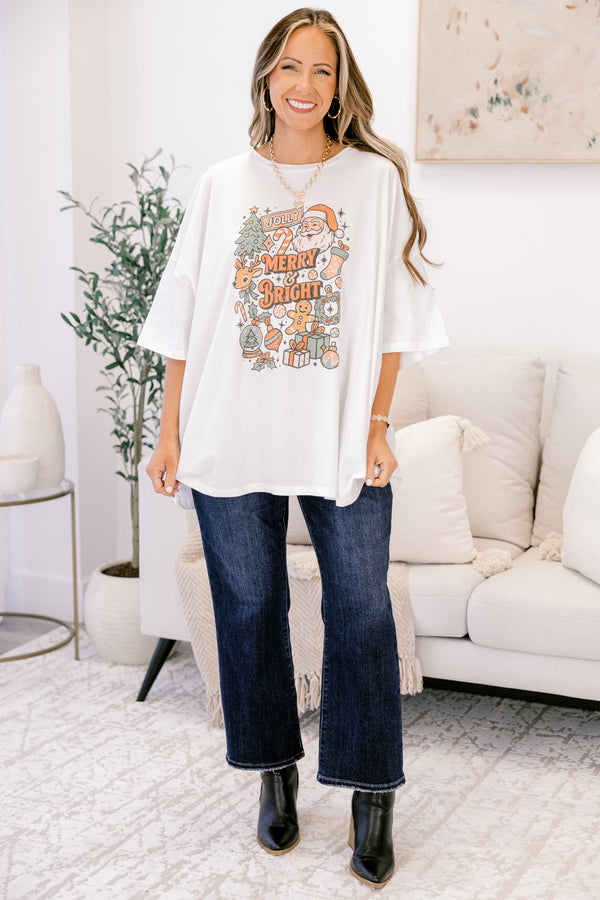 Chic Soul plus size clothing, oversized white boyfriend tee with Christmas vintage cartoon graphics and “Merry & Bright” written in the middle in vintage style font
