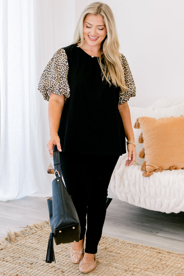Chic soul plus size clothing, black top with bubble sleeves that have a leopard print on them 