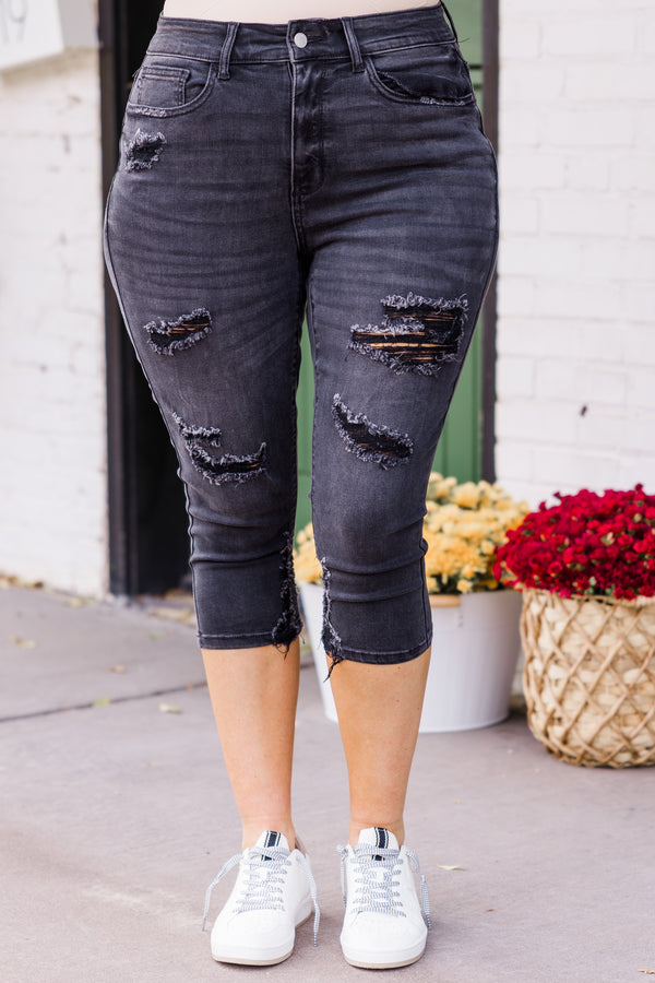Chic Soul plus size clothing, mid-waisted black capris pants with silver button and distressed detailing 