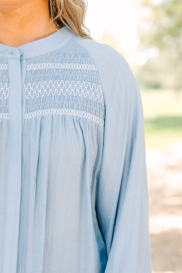 Plus size Jumping Ahead Top in chambray blue with smocked yoke, flowy fit, and balloon sleeves.