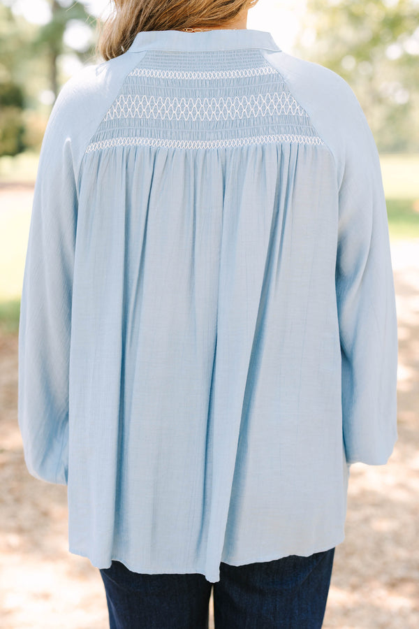 Plus size Jumping Ahead Top in chambray blue with smocked yoke, flowy fit, and balloon sleeves.