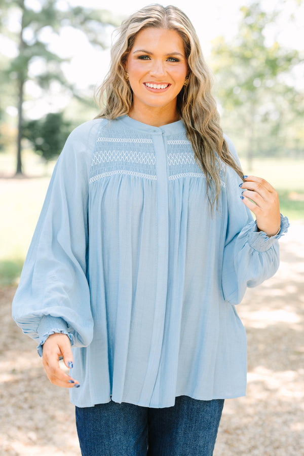 Plus size Jumping Ahead Top in chambray blue with smocked yoke, flowy fit, and balloon sleeves.
