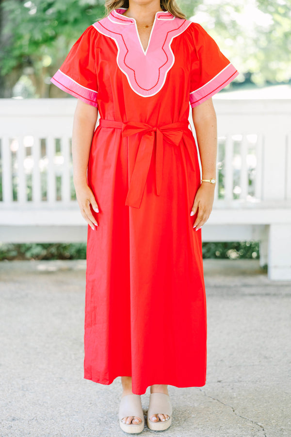 Plus Size red cotton midi dress with pink contrast trim, V-neckline, and adjustable waist belt.