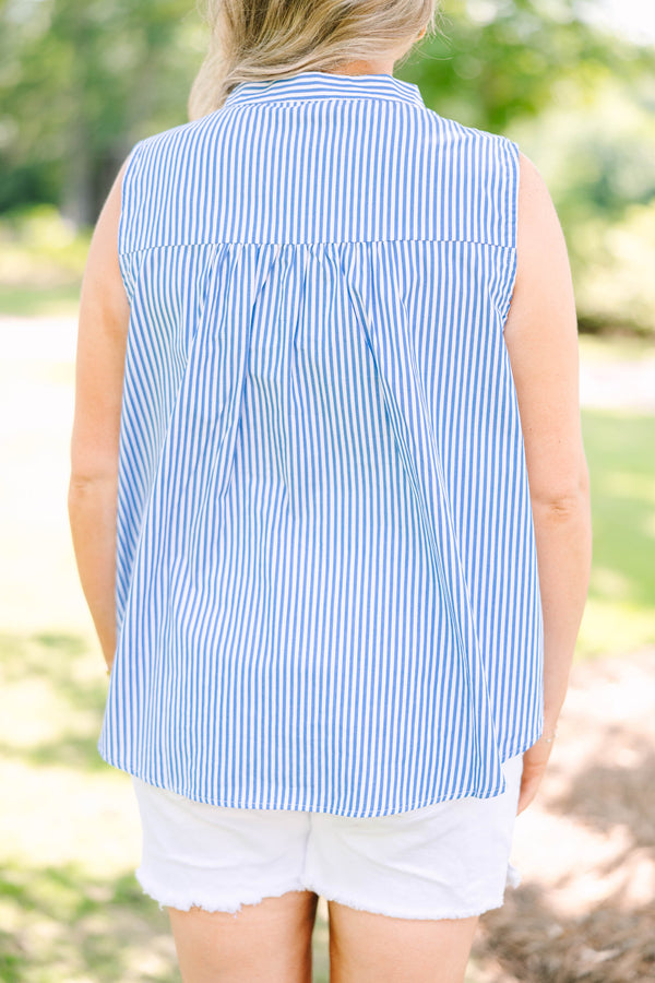 Plus Size blue and white vertical striped sleeveless button-down tank top with white denim shorts.