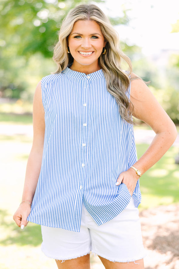 Plus Size blue and white vertical striped sleeveless button-down tank top with white denim shorts.