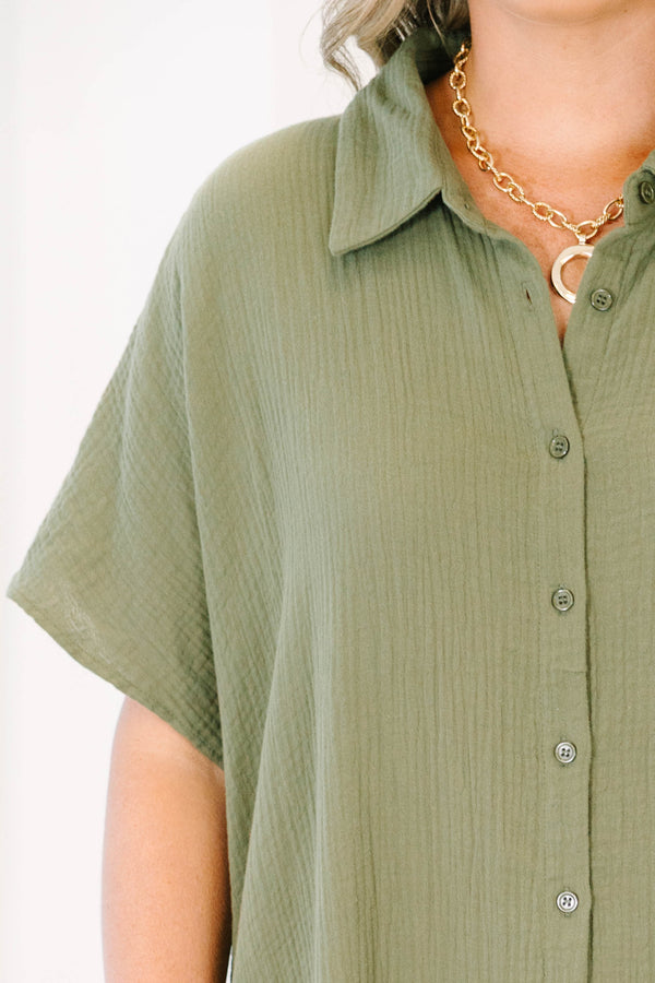 Plus Size olive green maxi shirt dress with short sleeves, a button-down front, and a collar.