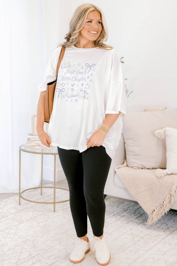 Chic Soul plus size clothing, oversized white boyfriend tee with “Just One More Chapter” written in light blue block font across the chest with book graphics