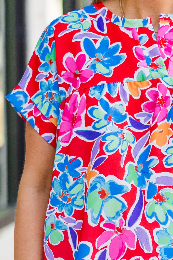 Chic Soul plus size clothing, short sleeve coral top with multi floral design with cuff sleeves with v cutout along neckline