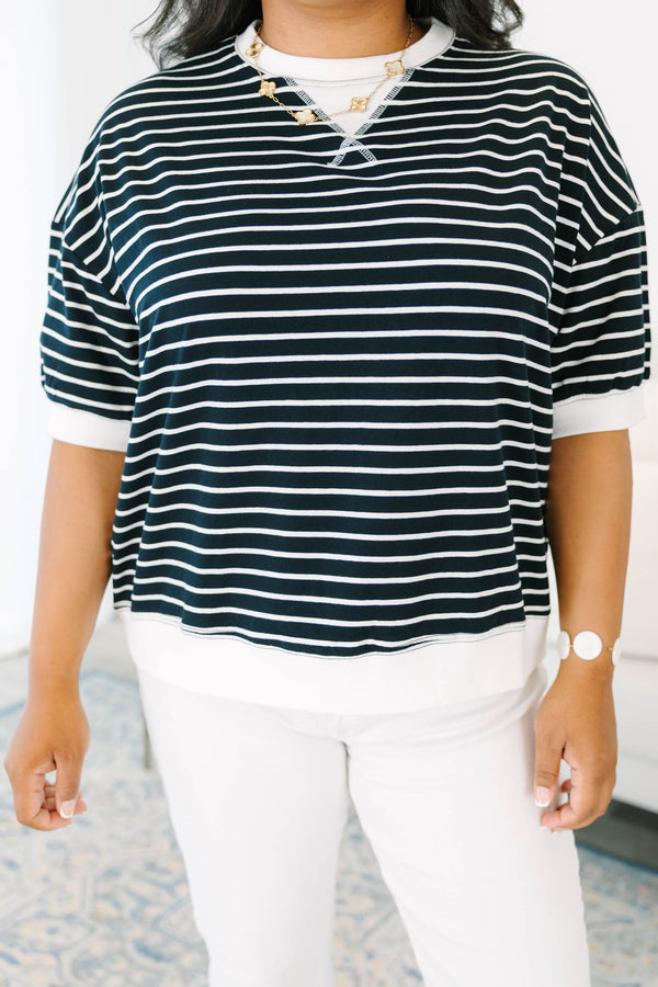 Plus Size black and white striped short-sleeve top with contrast ribbed crew neck and hem.