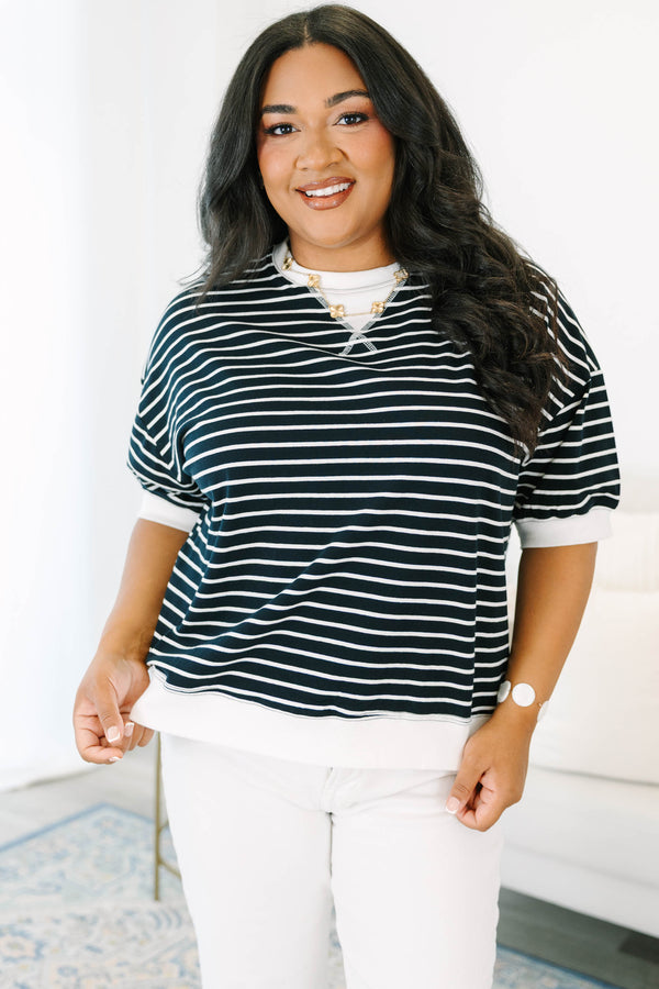 Plus Size black and white striped short-sleeve top with contrast ribbed crew neck and hem.