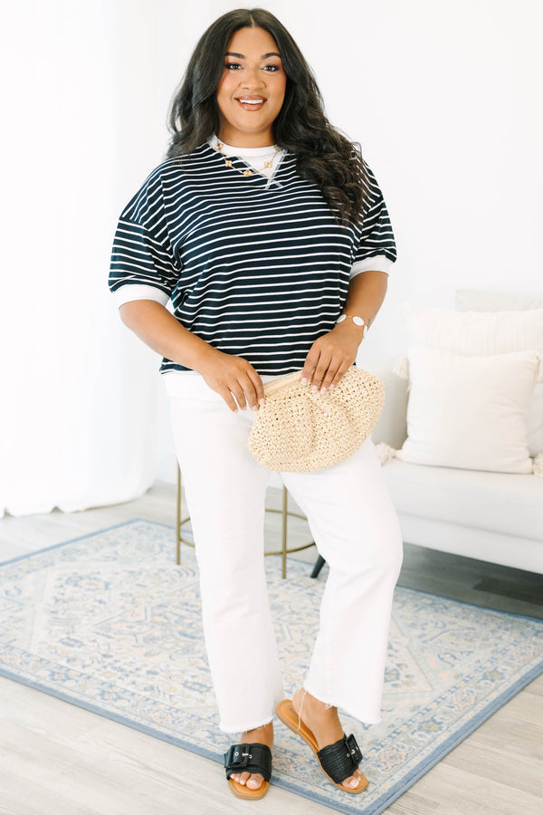 Plus Size black and white striped short-sleeve top with contrast ribbed crew neck and hem.