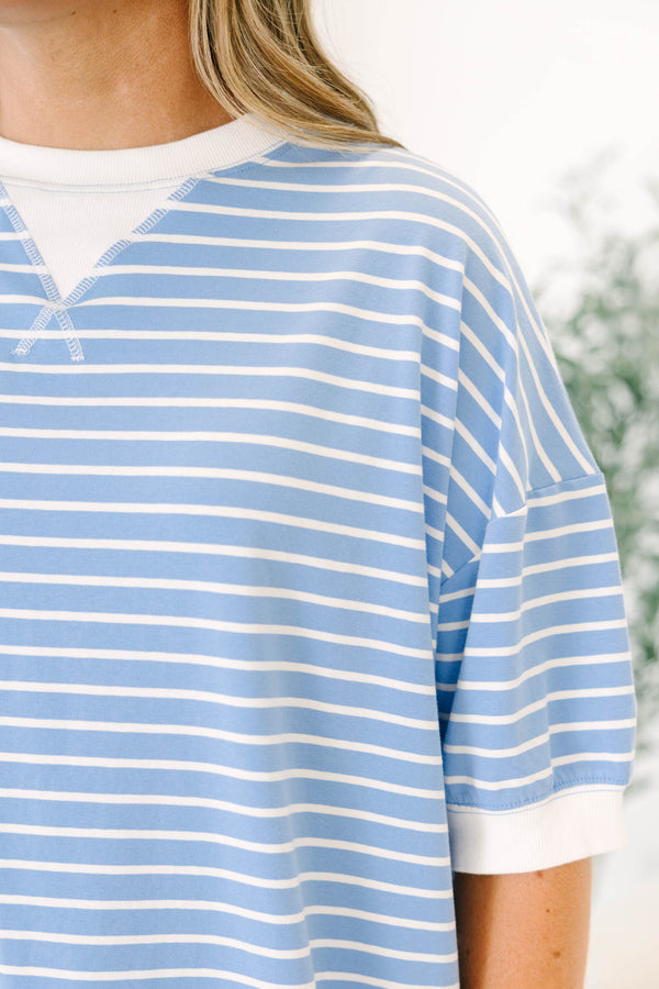 Plus Size cornflower blue and white striped short sleeve top with a white crew neck and hem.