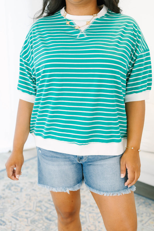Plus Size green and white horizontal striped short sleeve top with a white crew neckline and hem.