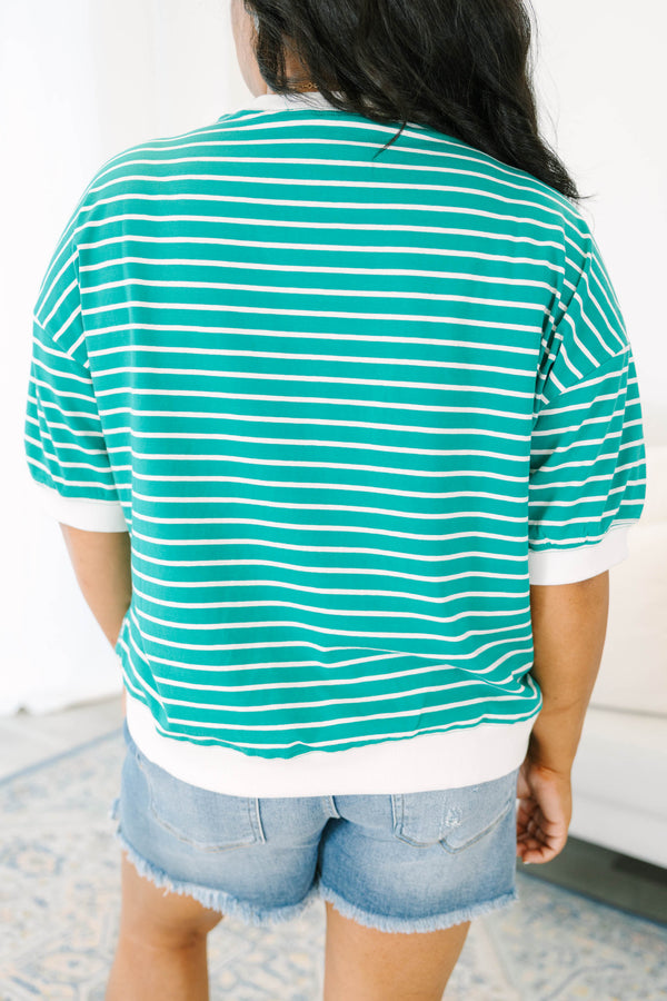 Plus Size green and white horizontal striped short sleeve top with a white crew neckline and hem.