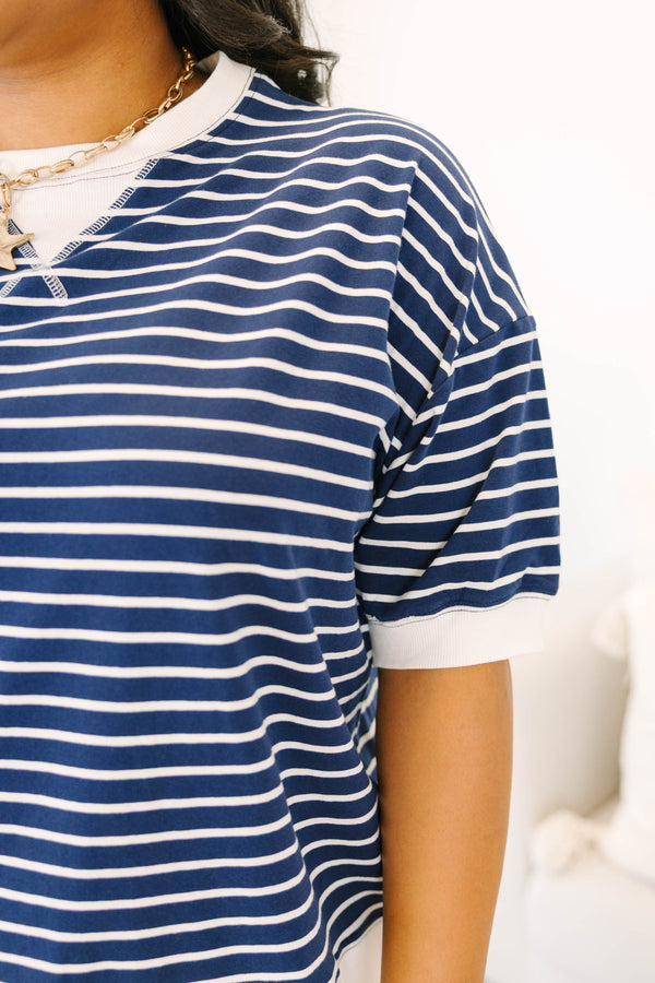 Plus Size navy and white horizontal striped short-sleeve top with a ribbed crew neck and hem.
