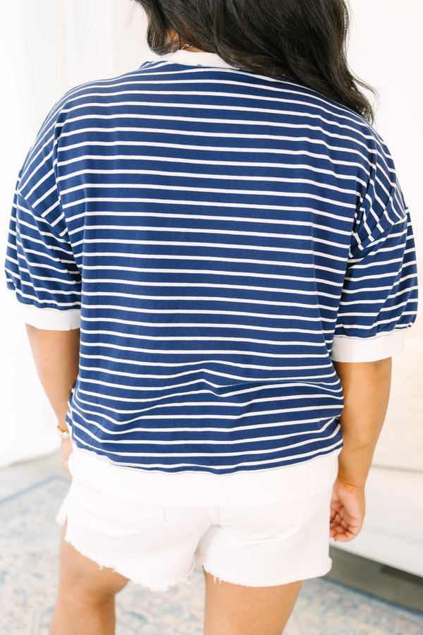 Plus Size navy and white horizontal striped short-sleeve top with a ribbed crew neck and hem.