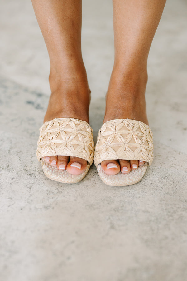 Plus Size natural woven block heels with a floral raffia pattern on the toe strap.