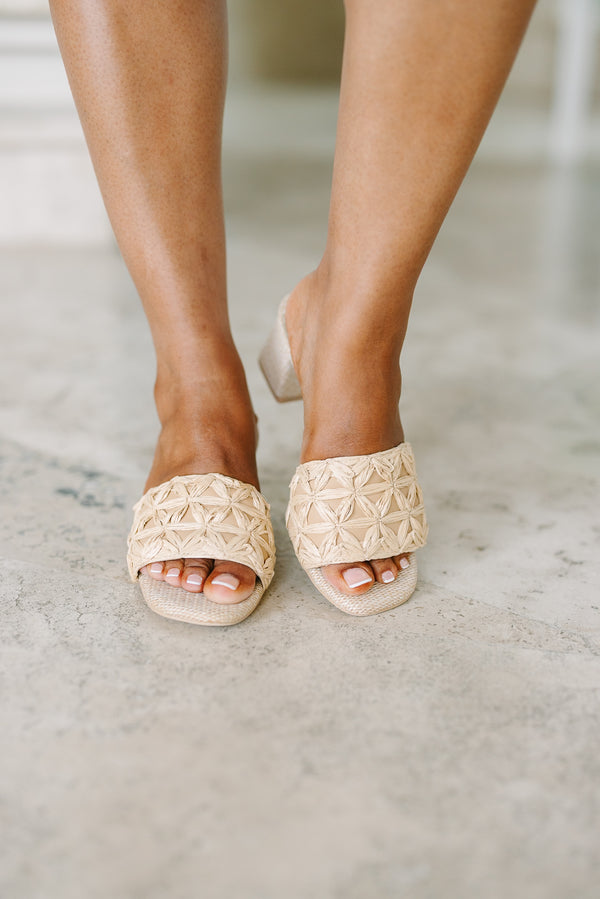Plus Size natural woven block heels with a floral raffia pattern on the toe strap.