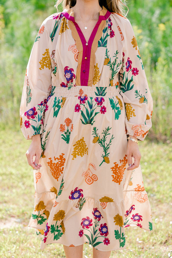 Chic Soul plus size clothing, tan long sleeve midi dress with multi color floral print, buttons going down the chest and a neckline with a collar that is magenta